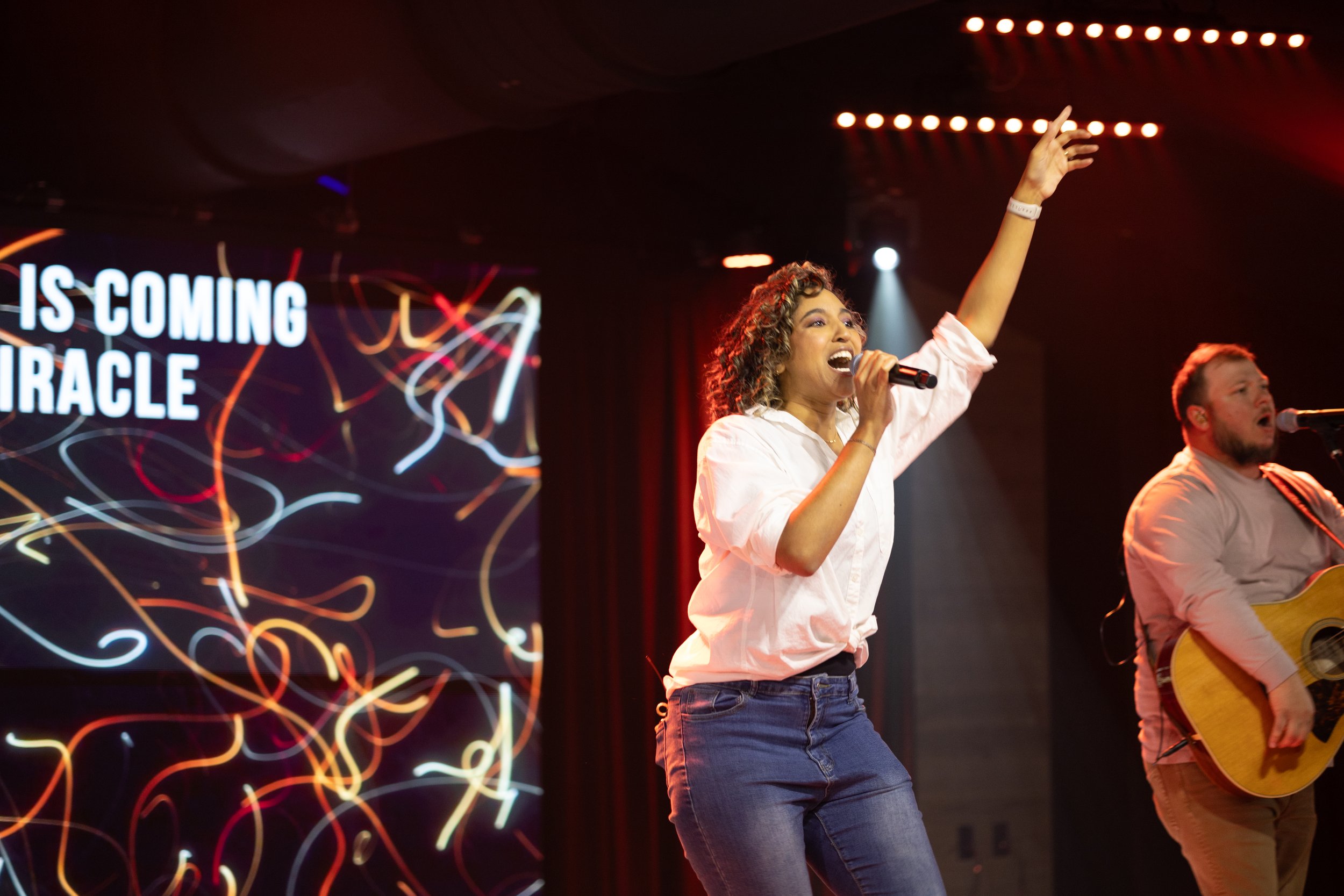 Worship team leading music at Christwalk Church